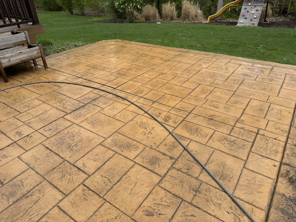 House washing in soft way removing stains from floor